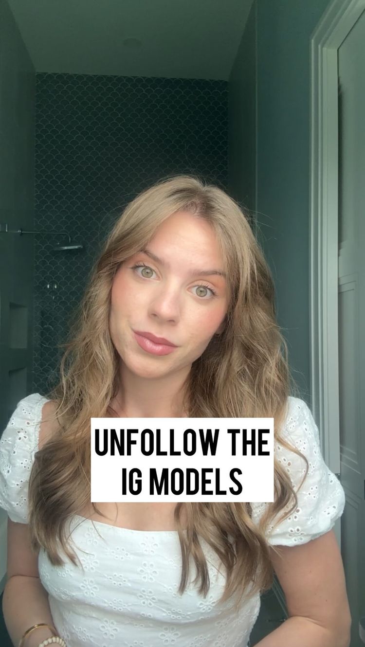 A woman with long blonde hair and fair skin gazes at the camera. The background is blurred but seems to depict a bathroom. Overlayed on the image is a white rectangle with the text: "UNFOLLOW THE IG MODELS".
