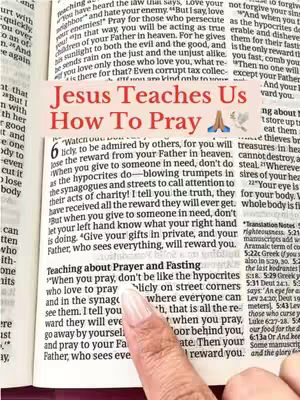 The image shows a close-up of an open Bible with text highlighted. A pinkish text overlay reads, "Jesus Teaches Us How To Pray." A hand with manicured nails points at the text near the bottom, with a finger touching the page.