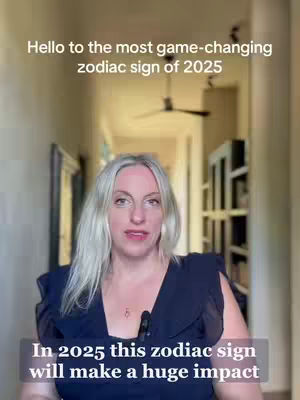 A woman with blonde hair in a dark blue top stands in front of a hallway, with text overlays. The background features a ceiling fan and a glimpse of bookshelves. The image has a warm, natural lighting.
