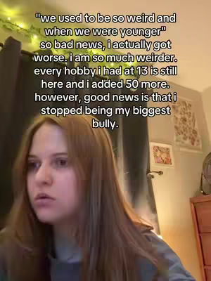 The cover image features a young woman with long brown hair, centered in a medium shot, looking slightly down and to the left with a thoughtful expression. Text overlays, set in a white font, are prominently displayed at the top, providing context. The background has partial visibility of the room and elements, in earthy tones, including a glimpse of a framed picture.