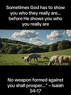 The image shows a landscape with green fields, hills, and a blue sky with clouds. Sheep are grazing in a field, and a wolf is standing among them. Text at the top reads, "Sometimes God has to show you who they really are… before He shows you who you really are." The bottom text says, "No weapon formed against you shall prosper…" - Isaiah 54:17.