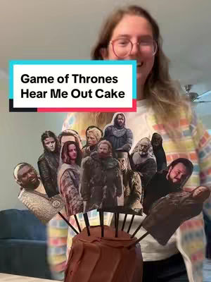 A medium shot shows a young woman with glasses and light brown hair in front of a frosted chocolate cake. The cake is decorated with several character cutouts from the "Game of Thrones" series. A text overlay reads, "Game of Thrones Hear Me Out Cake" while the woman smiles.