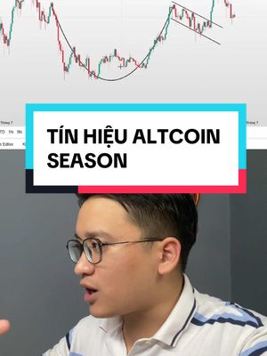 The cover image features a man in the foreground, wearing glasses and a white shirt with blue stripes. Behind him is a screen displaying a financial chart and an overlaid rectangular box with the text "TÍN HIỆU ALTCOIN SEASON". The overall composition suggests a video about cryptocurrency trading or analysis.