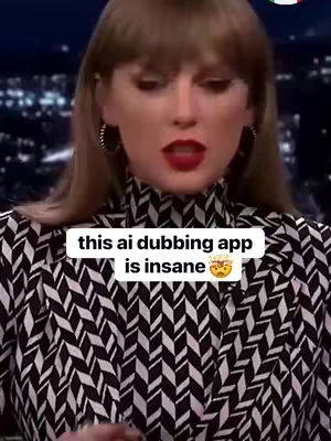 The cover image features Taylor Swift in a close-up shot, appearing to be in a studio setting. She wears a black and white patterned top with her hair styled in a bang. A white box with black text is superimposed on the image, and she is looking at the camera with red lipstick.