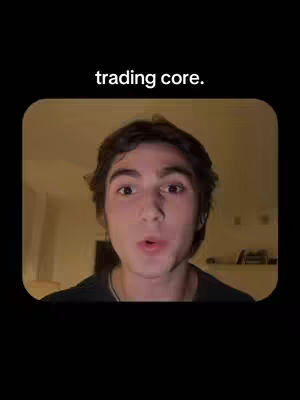 A well-lit image featuring a young man framed within a rounded rectangle against a black background. He has dark hair and is looking directly at the viewer with a slightly surprised expression. The hook "trading core." is across the top.