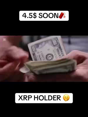 The cover image shows a close-up of a person's hands holding a stack of US dollar bills. The hands are visible, focusing on the paper currency. Text overlay on the top says "4.5$ SOON" with an explosive emoji, and another text at the bottom says "XRP HOLDER" with an emoji of astonishment.
