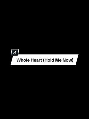 A simple image with a black background. At the top left corner, there's the TikTok logo. In the middle, a white banner with black text displays: 'Whole Heart (Hold Me Now)'.