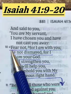 An image of a page of the Bible open to Isaiah 41:10. The text is emphasized with a blue pen, and a yellow banner with the text "Isaiah 41:9-20" is at the top.