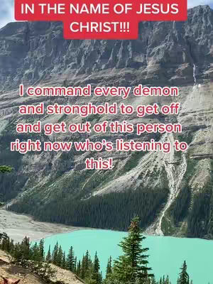 A scenic landscape features a high mountain range in the background with a vibrant turquoise lake and lush green forests in the foreground. Overlayed on the image are red and white text that display a prayer message. The overall composition creates a sense of tranquility and spiritual focus.