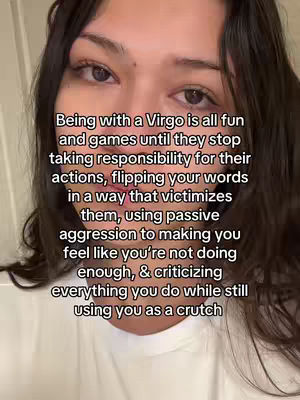 A close-up shot of a woman's face, with text overlayed on the image. The woman has brown hair and is wearing a white shirt. The text describes negative traits associated with Virgos.