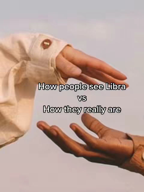 The cover image shows two hands reaching towards each other against a soft, muted background. The hand on the left, adorned in a long-sleeved cream-colored shirt, extends its open palm outwards towards the viewer. The other hand, featuring a darker skin tone, mirrors the gesture from the bottom. A text overlay runs across the image, creating a visual contrast with its stark black font.