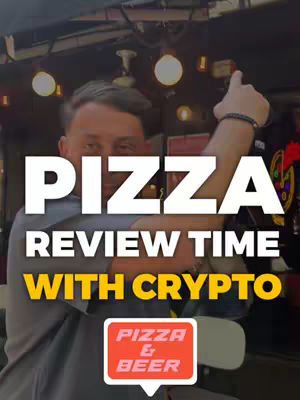 A man stands in front of a blurred background, likely a pizza place, pointing upwards. Overlaid text proclaims 'PIZZA REVIEW TIME WITH CRYPTO'. A small sign reading 'PIZZA & BEER' is in the foreground.
