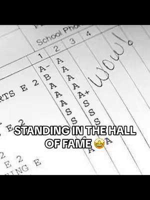 The image shows a close-up of a school grade sheet with high grades (A's and S's). The text overlay says "STANDING IN THE HALL OF FAME".