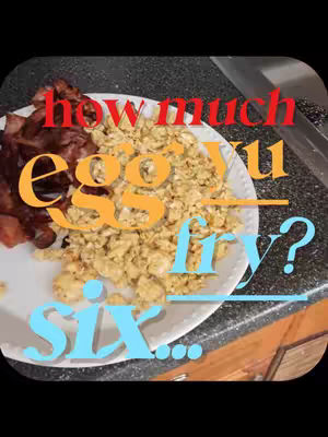 An overhead shot of a plate with scrambled eggs and bacon on it. Text overlay says: "how much egg you fry? six..."