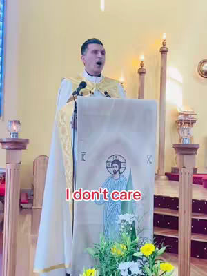 A man in religious attire stands behind a podium in a church, speaking with his mouth open. The podium has an image of Jesus. "I don't care" is written across the image in a red font.