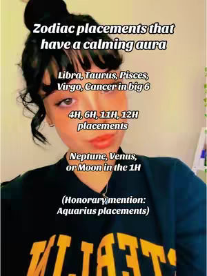 A selfie-style video cover with the creator centered, dressed in a dark top, and positioned with text overlays. Above the creator, overlaid text in a stylized white font announces, "Zodiac placements that have a calming aura." Below this are listed astrological placements. The background isn't visible, focusing on the creator and text.