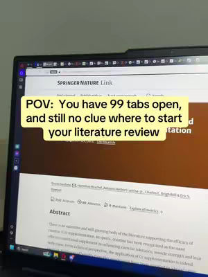 A computer screen displays a webpage from Springer Nature. A yellow rectangular text overlay states, 'POV: You have 99 tabs open, and still no clue where to start your literature review.' The screen primarily shows text, including a title, publication details, and a section labeled 'Abstract.' The background is blurry, suggesting a natural setting.