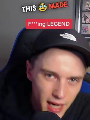 A man in his late 20s or early 30s is facing the camera with a black cap, expressing his views. Above his head is text saying, 'This made' with a smiling emoji. Below the text is a red rectangle highlighting 'F***ing LEGEND'. He's in a room casually.