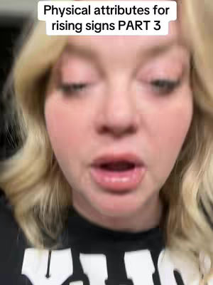 A close-up shot of a woman with blonde wavy hair looking down, with overlay text at the top. The woman is wearing a dark top. The skin tone is fair, and she's looking down at the center.