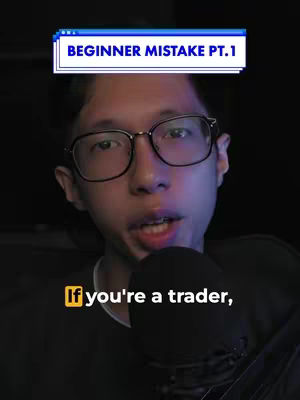 A man with glasses and a microphone is centered in a dimly lit setting. Above him, the words 'BEGINNER MISTAKE PT.1' are displayed, while below, text reads, 'If you're a trader,' emphasizing his role and the video's theme.