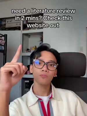 A young man with glasses points upwards while looking at the camera. Text overlays are present.