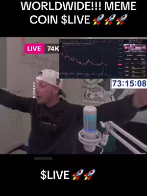 The cover image shows a man in a white cap, likely in his late 20s or early 30s, with his arms outstretched. The background is a room with a screen displaying a cryptocurrency chart and a timer. Text overlays include "WORLDWIDE!!! MEME COIN $LIVE" at the top, "$LIVE" and rocket ship emojis at the bottom. The image is a vertical shot suitable for a social media or video platform post.