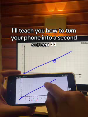 The cover image showcases a person's hands holding a smartphone displaying a graph, with a larger screen in the background also showing a similar graph. Text overlayed at the top in a white font.