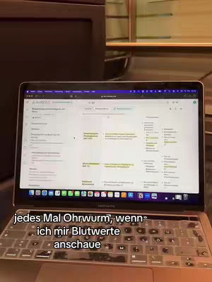 The cover image shows a laptop displaying a medical study interface, with text overlays on the image. The laptop is on a working surface in front of a darker background.
