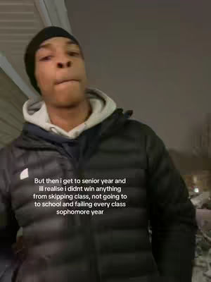 A young Black man in a black beanie and jacket is looking slightly to the left of the camera with a neutral expression. Text is overlaid on the bottom part of the image, explaining a relatable high school experience.