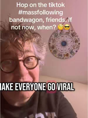 The cover image is a selfie-style shot featuring a person with glasses and short, highlighted hair. The person smiles at the camera, and the background includes a wall with a decorative circular item on it. Text overlays at the top and bottom. The color palette appears to have a pink hue.