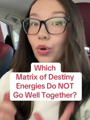 A woman with long brown hair wearing black-rimmed glasses is speaking directly to the camera. She is in a car, as evidenced by the seat behind her. Overlaid on the image is a white rectangular graphic with red text that reads, "Which Matrix of Destiny Energies Do NOT Go Well Together?"