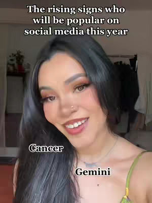 A woman with long black hair, wearing makeup and a necklace, smiles at the camera. The text overlay says 'The rising signs who will be popular on social media this year'. 'Cancer' and 'Gemini' are also labeled on the image.
