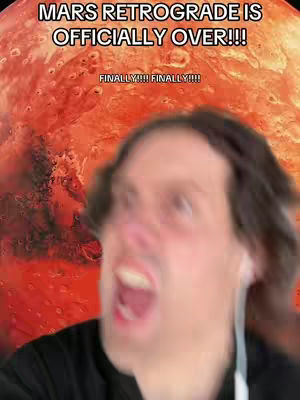 A blurred, close-up shot features a person with dark hair and a black top, their face contorted in an expression of open-mouthed surprise or excitement. The background showcases a blurred red planet with some text overlays.