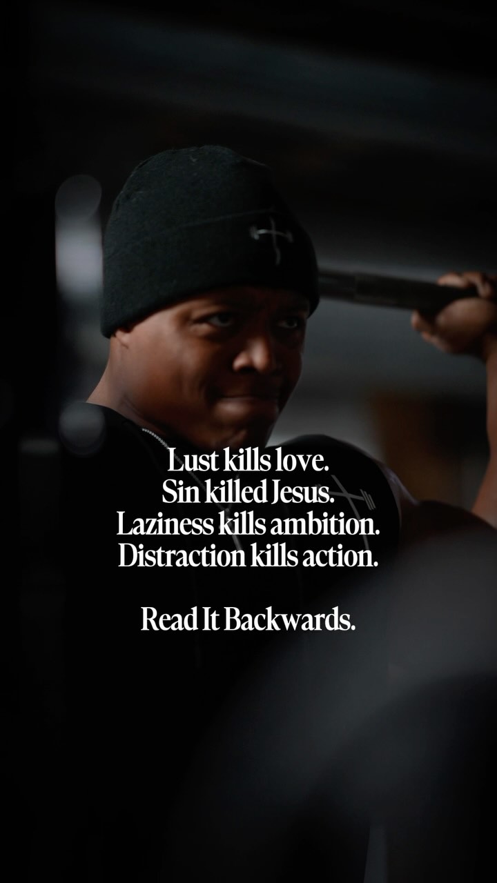 A person, wearing a black beanie with a cross, is in a weightlifting position. The lighting is dim, focusing on the person's face and upper body. Text overlays at the bottom with a white font, including "Lust kills love… Read It Backwards."