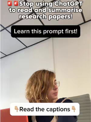 The image features a woman looking left with text overlays. The background is a light-colored ceiling with geometric patterns. The foreground includes text that reads: "Stop using ChatGPT to read and summarise research papers! Learn this prompt first! Read the captions". A banner-shaped text box reads "Read the captions" with pointing hand emoji.