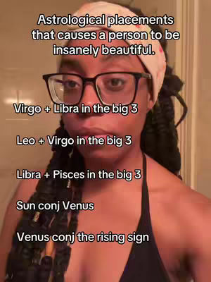 A close-up shot features a Black woman looking directly at the camera with a neutral expression. She wears black-framed glasses and a light-colored headband. Text overlays list astrological placements.