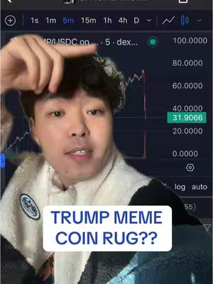 A young man with black hair is centered in the frame, wearing a cream and black jacket, and pointing his finger towards the top left. A screen behind him displays a stock chart with a green price indicator. A white rectangle in the foreground contains the text "TRUMP MEME COIN RUG??" in blue.