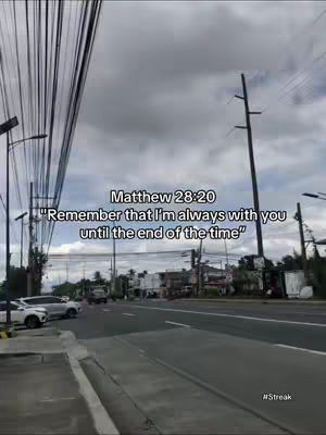 An overcast day landscape with roads, buildings, and power lines. Text overlays are added for a bible verse.