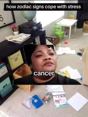 The image features a person's face prominently, framed by a cluttered indoor setting. The face, which appears to be that of a middle-aged woman, is the main focus, and the image has a slightly desaturated, indoor daytime lighting. A text overlay gives context to the person relating to the zodiac sign cancer.