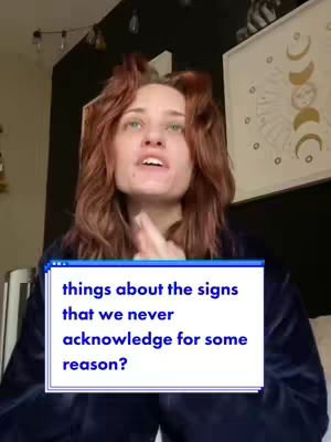 A woman with auburn hair is speaking with her hands clasped in front of her. A text box in the bottom center contains white text on a blue background.