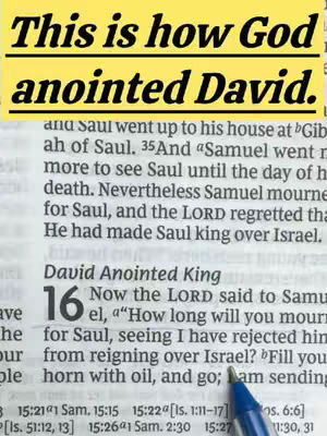 The image is a close-up of an open book with text. The text is predominantly black and white with a blue pen pointing at it. Across the top, there's a yellow rectangular background containing the text, in bold, black font, "This is how God anointed David."