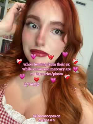 A close-up shot features a woman with long, auburn hair and fair skin. She has her hand near her head. Overlaying her face and hair are various heart graphics, some are pink, while others appear to be broken hearts and the center heart is shattered. Text is also overlaid on the image, stating the video’s theme: astrology and relationships.