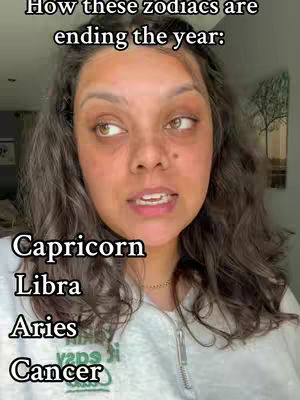 A woman with curly brown hair looks slightly off-camera with a questioning expression. Text overlays list zodiac signs in a casual font at the bottom.