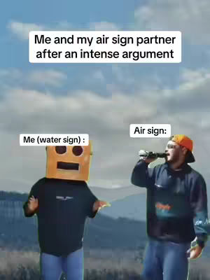 The image presents a humorous depiction of a relationship dynamic based on zodiac signs. Two figures stand against a backdrop of a cloudy sky and rolling green hills. One figure, labeled 'Me (water sign):' is a person with a box head like a robot. The other is labeled 'Air sign:' and holding a beverage to their mouth. Text overlays clarify context