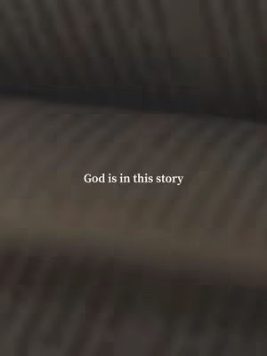 The cover image presents a blurred, textured background with an overall dark, brown color palette. The text, "God is in this story," is centrally placed in a light color.