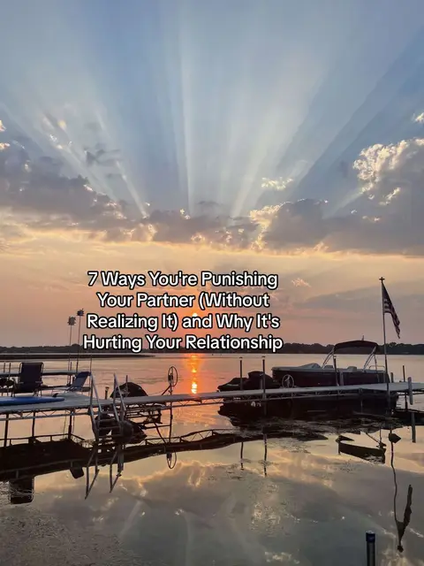 A scenic shot of a lake at sunset. The sky is filled with vibrant orange and yellow hues, with dramatic rays of light streaming through the clouds. A pier with a boat and an American flag is visible, and text overlays the image.