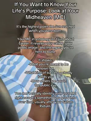 A selfie-style video with a woman in the foreground. The background includes text overlays. The woman appears to be inside, possibly in a room, with the text layers covering the central part of the image. The lighting is natural.