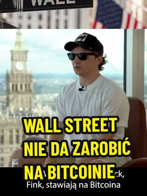 A man wearing sunglasses and a cap is seated, with a city skyline and an American flag visible in the background. The text overlay reads "WALL STREET NIE DA ZAROBIĆ NA BITCOINIE" in large yellow letters with a black outline, followed by smaller white text that reads "Fink, stawiają na Bitcoina".