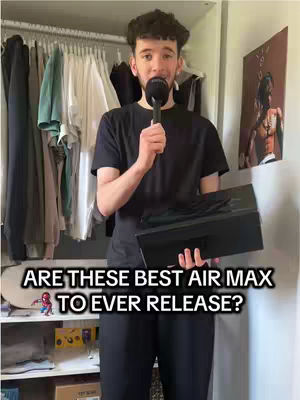 A young man stands in front of a closet, holding a microphone in one hand and a black shoebox in the other. The overlay text uses white font with a black outline, which asks, 'ARE THESE BEST AIR MAX TO EVER RELEASE?'