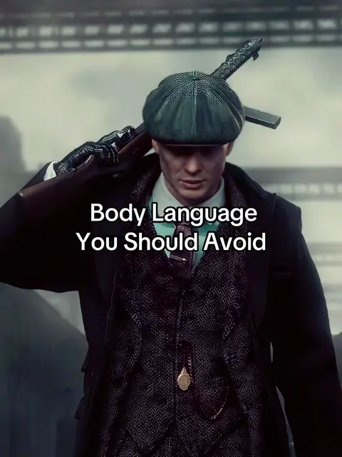 The image features a man in a Peaky Blinders-style outfit, with a flat cap and coat, holding a rifle over his shoulder. Text overlayed on the image reads "Body Language You Should Avoid."
